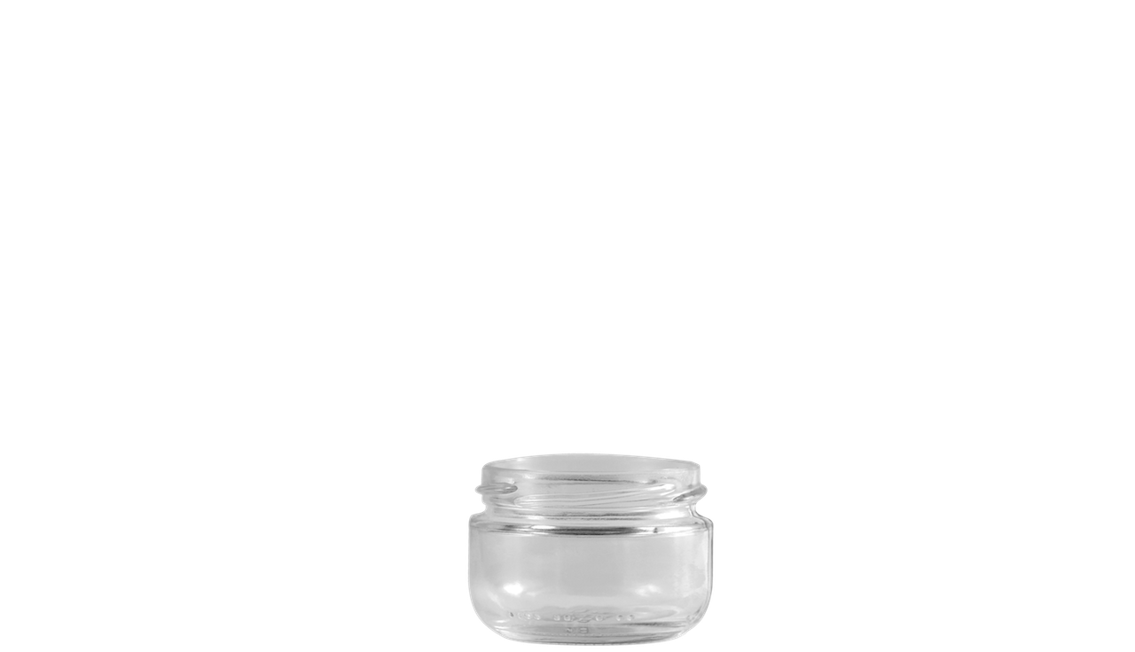 Envase de vidrio transparente y circular de capacidad reducida.