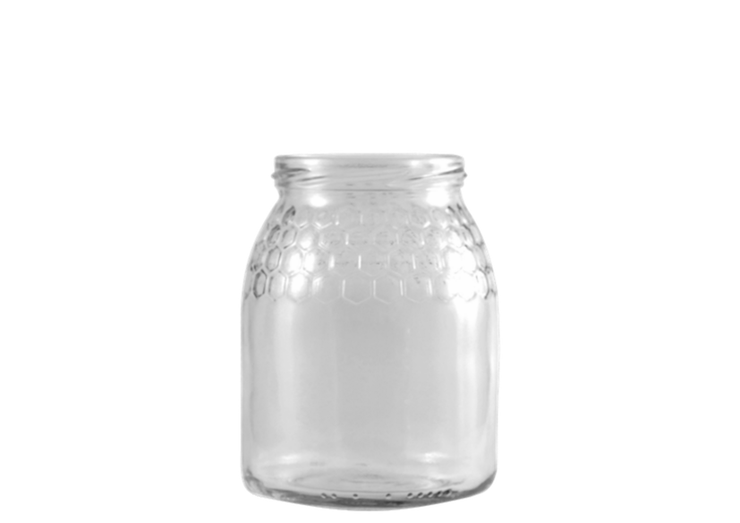 Envase de vidrio transparente, circular y de forma ovalada, con un grabado de celdillas hexagonales en su cuello, de gran capacidad.